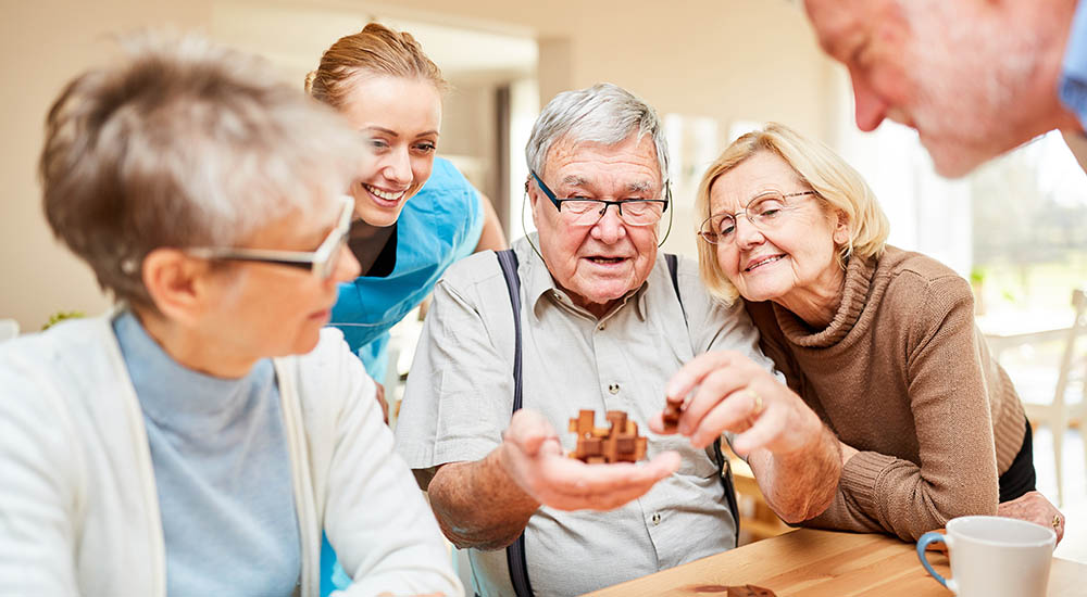 family playing game with grandpa