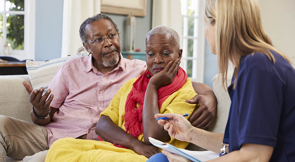 social worker visits family at home