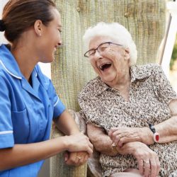caregiver visits with senior lady