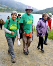 photo of two hike participants in green event t-shirts