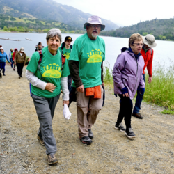 photo of two hike participants in green event t-shirts